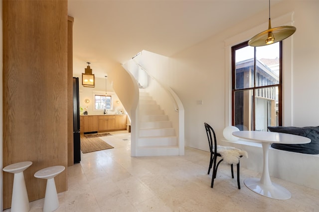 dining space featuring sink