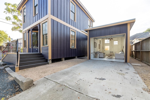 back of house with a patio