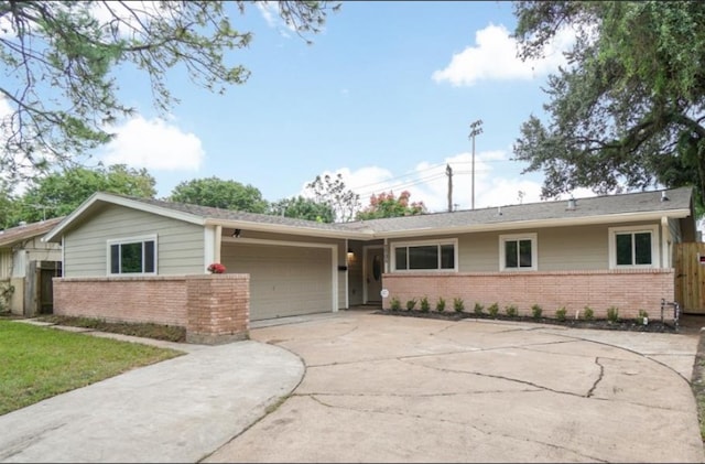 ranch-style home with a garage