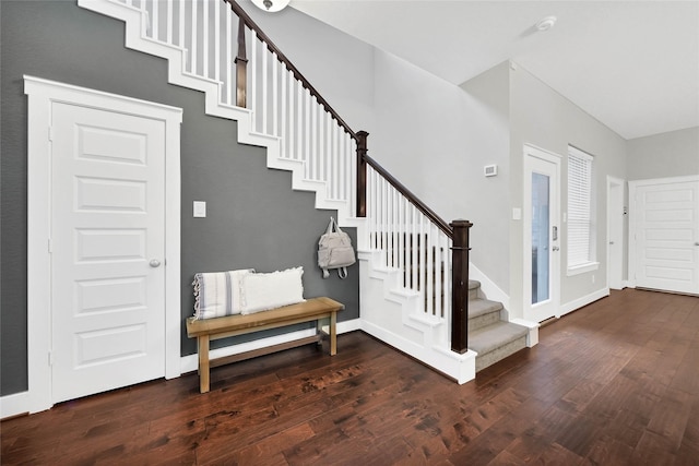 entrance foyer featuring dark hardwood / wood-style flooring