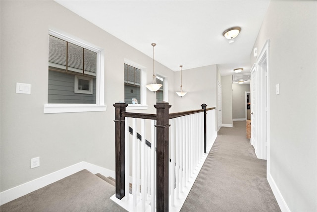 corridor with carpet floors