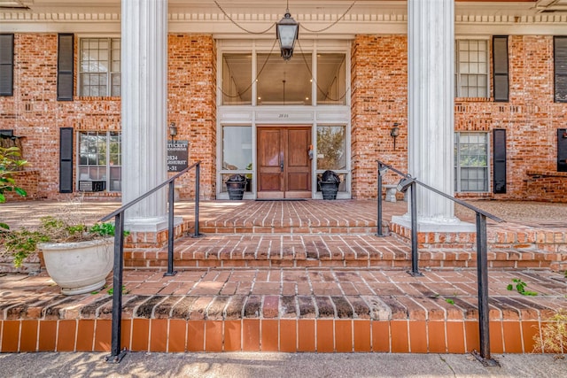 property entrance with covered porch