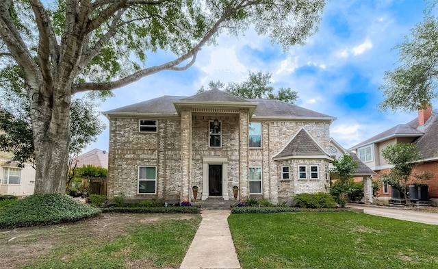 view of front of home with a front yard