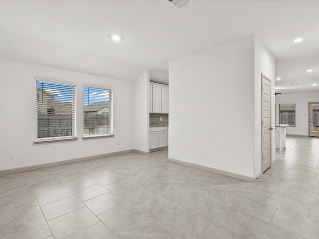 view of tiled spare room