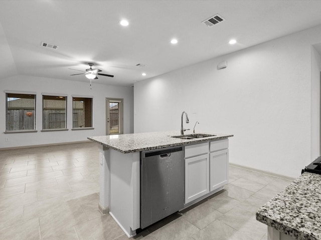 kitchen with sink, dishwasher, white cabinetry, light stone counters, and a center island with sink