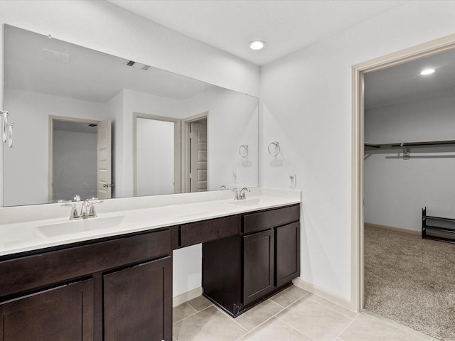 bathroom featuring tile patterned floors and vanity