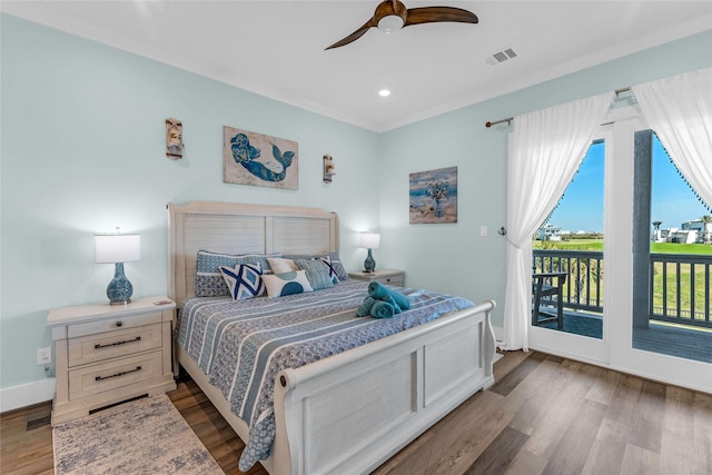 bedroom with wood-type flooring, access to outside, and ceiling fan