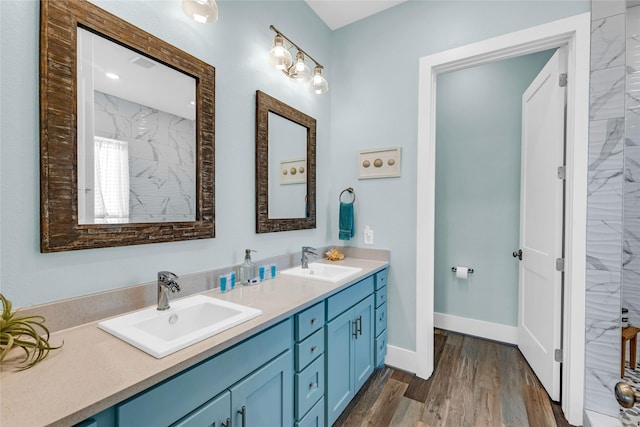 bathroom featuring vanity and hardwood / wood-style flooring