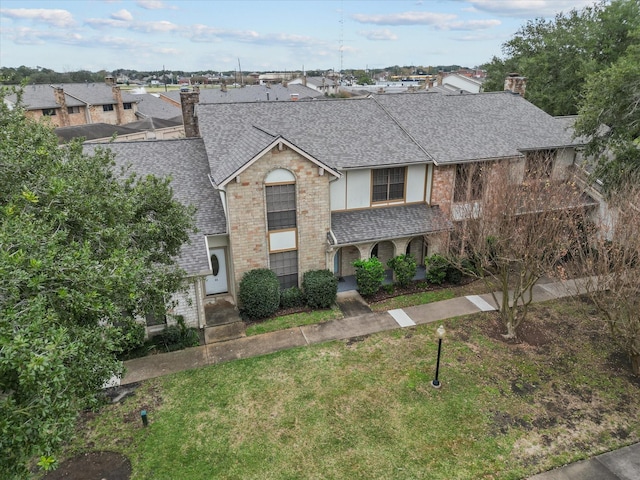 view of front of property with a front yard