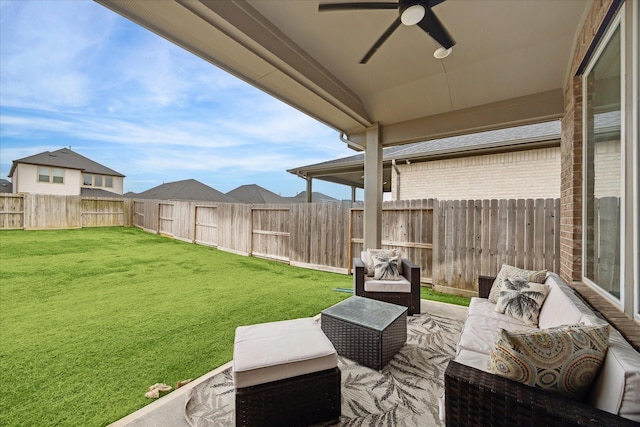 exterior space featuring an outdoor hangout area and ceiling fan