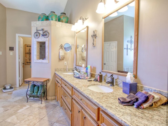 bathroom with vanity and tile patterned flooring