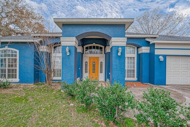 view of front of home featuring a garage