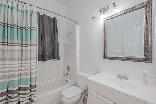 full bathroom with shower / bath combination with curtain, vanity, and toilet