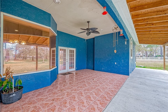 view of patio / terrace featuring french doors and ceiling fan