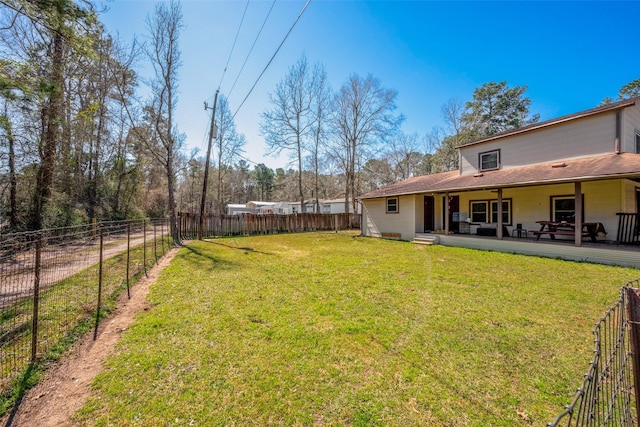 view of yard with a fenced backyard