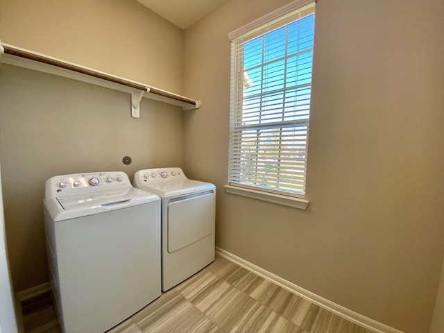 laundry room with independent washer and dryer