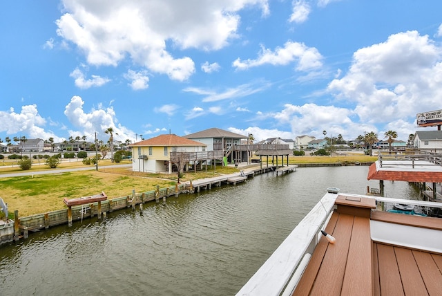 dock area with a water view