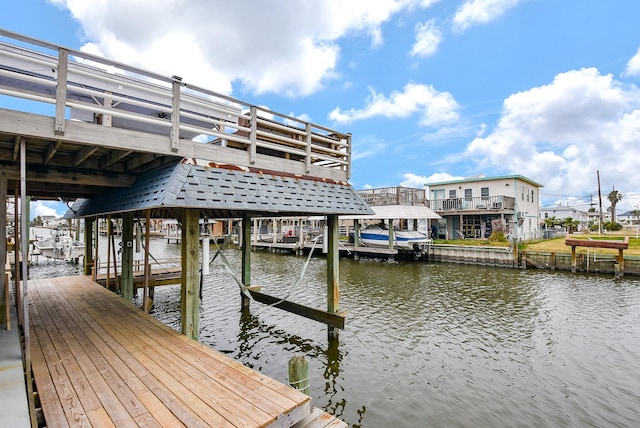 view of dock with a water view