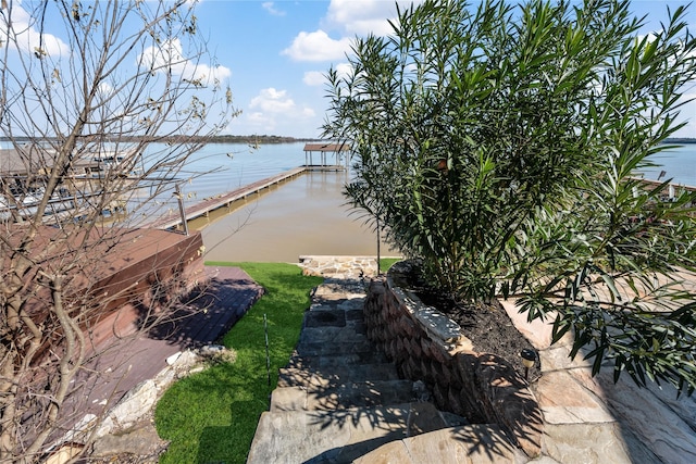 dock area featuring a water view