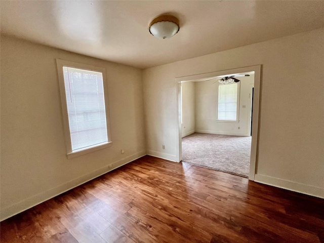 empty room featuring wood-type flooring