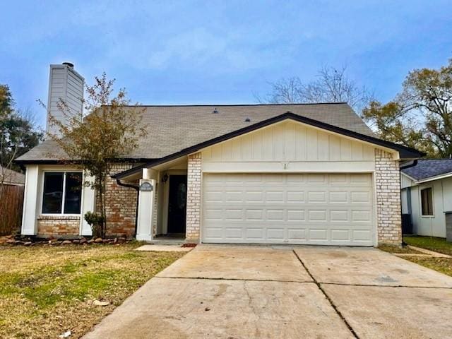 single story home featuring a garage