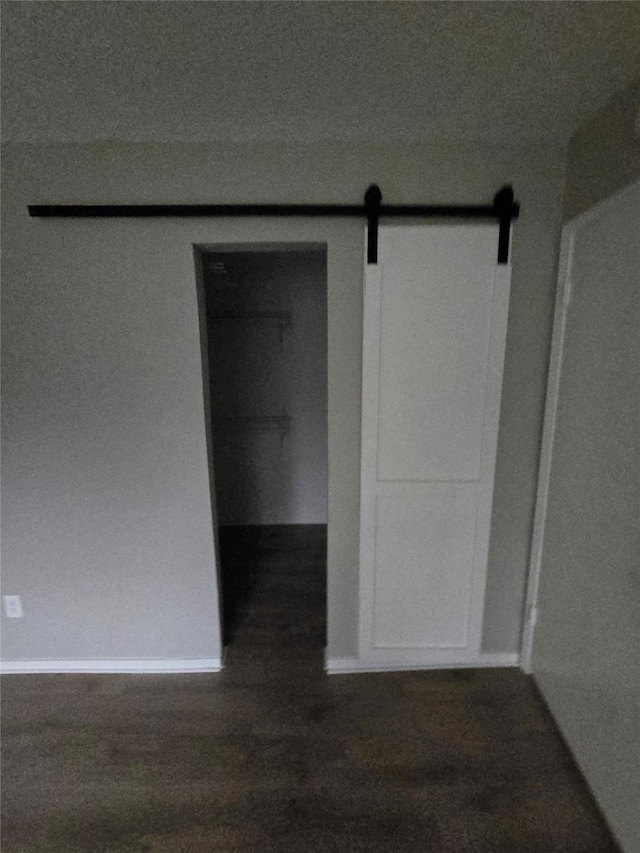 interior space featuring a barn door