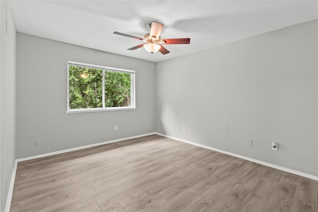 22706 Braken Carter Ln, Katy, TX 77449 - unfurnished room with wood finished floors and ceiling fan