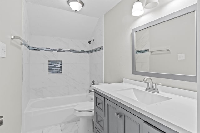 22706 Braken Carter Ln, Katy, TX 77449 - bathroom featuring vanity, marble look tiles, and shower / tub combination