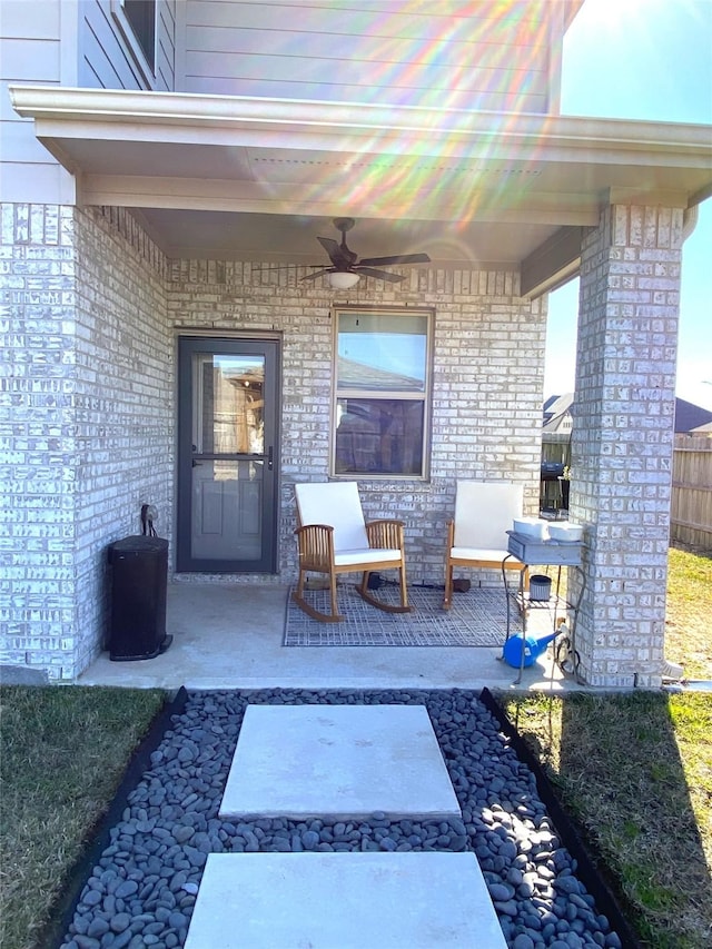 view of patio / terrace featuring ceiling fan