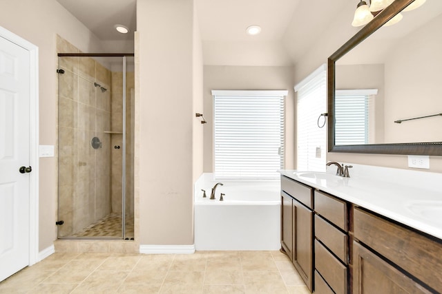 bathroom with vanity, independent shower and bath, and tile patterned flooring