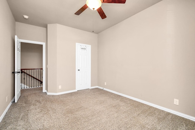 unfurnished bedroom featuring carpet flooring and ceiling fan