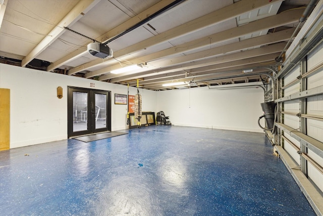 garage with french doors and a garage door opener