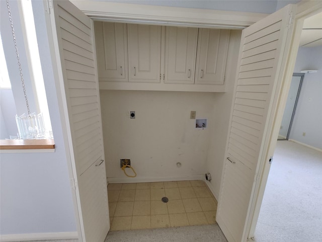 clothes washing area featuring cabinets, washer hookup, hookup for an electric dryer, and light carpet