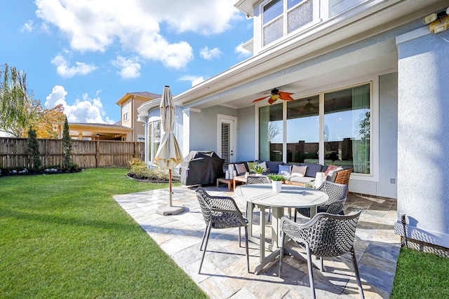 view of patio featuring a grill, outdoor lounge area, and ceiling fan