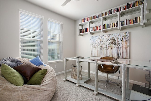 home office featuring carpet floors and ceiling fan