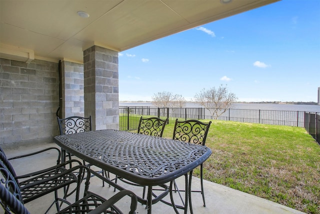 view of patio / terrace featuring a water view