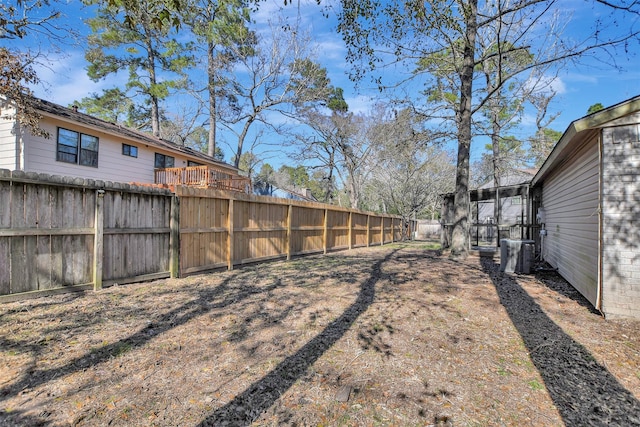 view of yard featuring central air condition unit