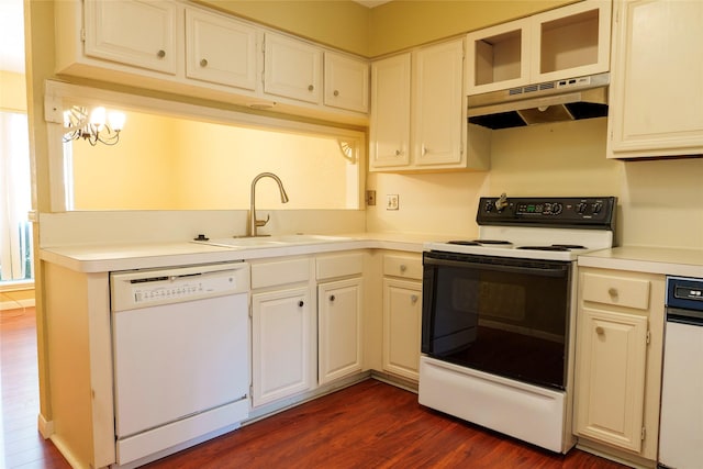 kitchen featuring sink, electric range, dark hardwood / wood-style floors, white dishwasher, and white cabinets