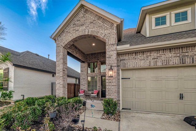 view of front of property with a garage