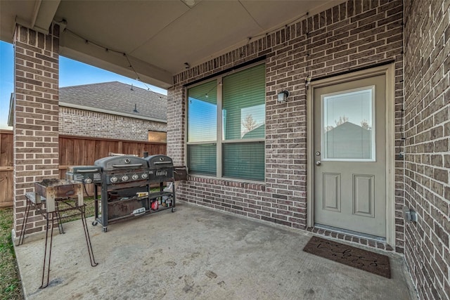 property entrance featuring a patio