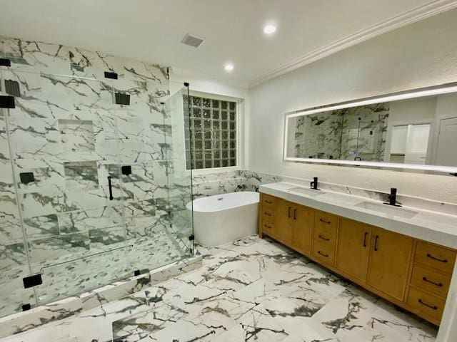 bathroom featuring ornamental molding, shower with separate bathtub, and vanity