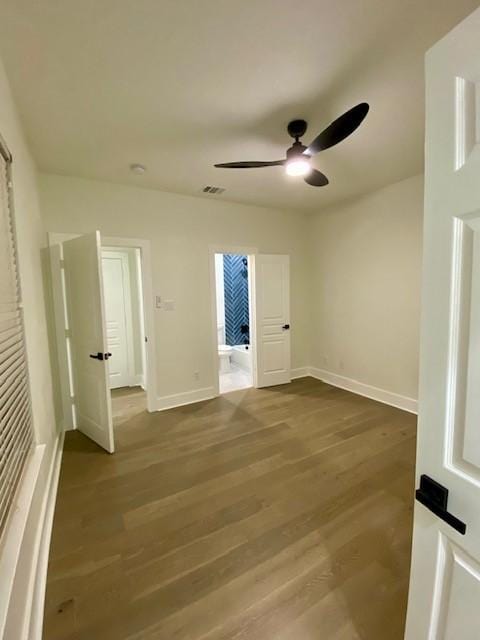 unfurnished bedroom featuring ceiling fan and wood-type flooring