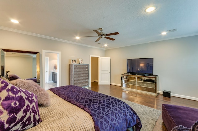 bedroom with ensuite bath, dark wood-type flooring, ceiling fan, ornamental molding, and a textured ceiling