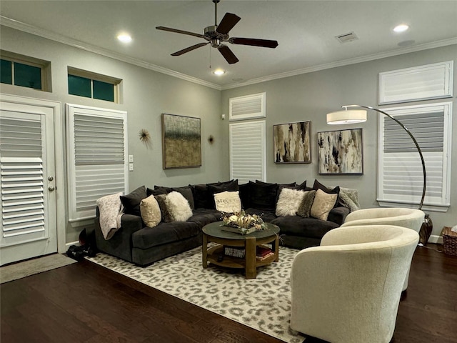 living room featuring dark hardwood / wood-style flooring, ornamental molding, and ceiling fan