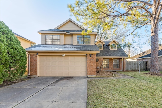 front of property with a garage and a front yard