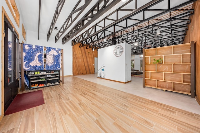 living room with a towering ceiling