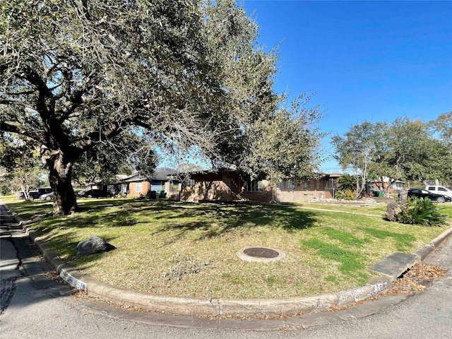 view of front of property with a front yard