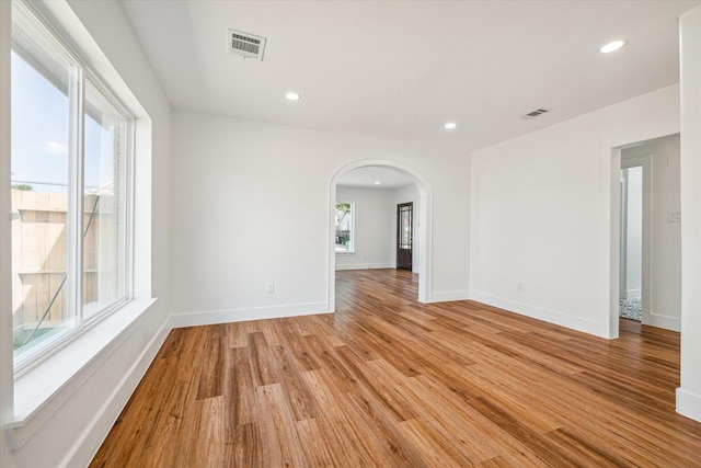 spare room with light hardwood / wood-style flooring