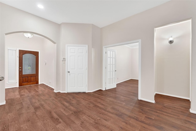 foyer with dark wood-type flooring