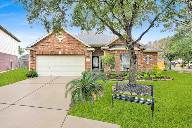 view of front of property featuring a garage and a front yard